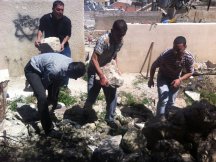 cleaning the area arond the Tel Rumeida building that will be used as a kindergarten 3