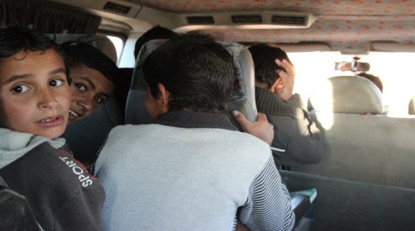 All the children that were interviewed had something positive to say about the transport. Others had very similar ideas than any teenagers around the world. "Now I don't have to wake up so early to walk to school. That is muuuuucccchhhh better than last year", Omar Mahmoud Suleiman Smeira Al Najada, 13, says.  Photo by Rami Kolehmainen/HIRN.